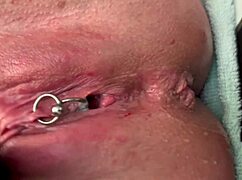 Pierced Clit Rubbed Hard In Latex And Pee Stream!