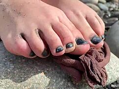 Imagine the goddess revealing her messy nylon feet in torn pantyhose by the river bank, toes wiggling close up