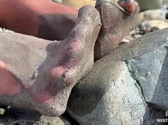 Imagine the goddess revealing her messy nylon feet in torn pantyhose by the river bank, toes wiggling close up