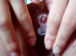 I'm opening my tight Asian teen pussy with a dildo for pleasure