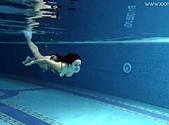 Does Diana Rius touch her hot tits underwater?