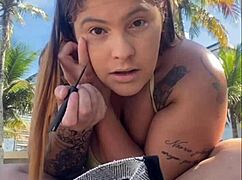 African woman flashes big pussy on beach exhibition