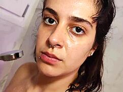 Amateur 18yo brunette with natural big tits showers on camera