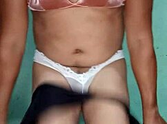 getting excited in a white thong, dancing around in lingerie.