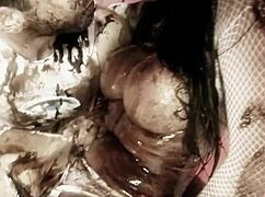 Naughty Brunette And Her Man Play With Dark Oil And Fuck Doggy Style