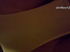 Teasing milf in lingerie shows hairy pussy under skirt