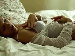 skinny roxana explores her body with fingers in the bedroom