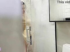 The Brazilian crossdresser with big natural tits washes her pussy and then hooks up for interracial sex with a black guy in this amateur clip