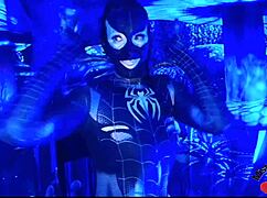 sexy spiderbabe in halloween costume teasing with contrasts