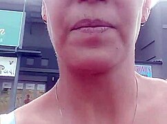 does the housewife slut flash tits and play pussy outdoors?