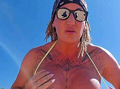 Tattooed Muscular Bodybuilder MILF with Big Tits and Ass Gets Anal Fucked on the Beach
