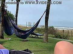 the milf grabs big cock for public beach handjob until cum explodes in close up pov action