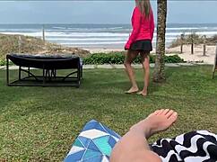 the milf grabs big cock for public beach handjob until cum explodes in close up pov action