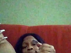 Ebony beauty with hairy pussy making herself creamy through intense self-pleasure