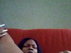 Ebony beauty with hairy pussy making herself creamy through intense self-pleasure