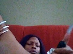 Ebony beauty with hairy pussy making herself creamy through intense self-pleasure
