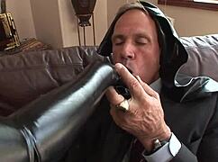 Alana Evans, the latex mom, bends over for a juicy blowjob.