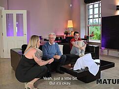 April Velvet boldly milks neighbor's big cock with her amazing tits while husband sits next door.