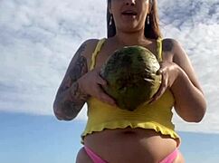 Can you see her swollen pussy lips flashing in that tiny bikini?