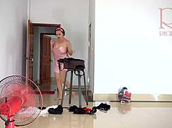 chick tries on linen and dresses at the resort