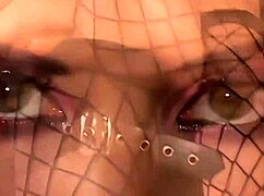 Join the Threesome with This Brunette Slut in Fishnets and Heels