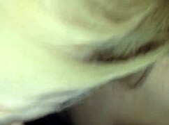sexy redhead young girlfriend giving a suggestive blowjob to her boyfriend