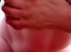 Mature woman receives handjob and blowjob during massage.