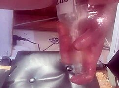 Watch this huge bottle slide deep into my tight ass!