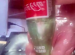 Watch this huge bottle slide deep into my tight ass!