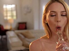 does this hot petite blonde teen love masturbating her shaved pussy with a glass dildo?