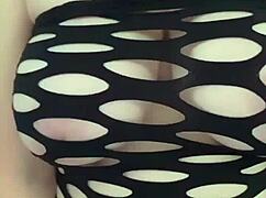 look at this sexy milf flaunting her big tits and ass