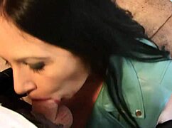 Goth girl with huge tits sucks dick in leather jacket