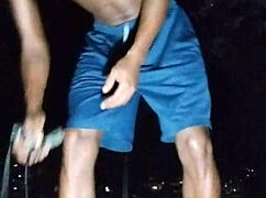 in the park, a cute brunette works out at the gym with her uncle