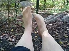 European girl takes a little nylon walk in the forest