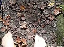 European girl takes a little nylon walk in the forest