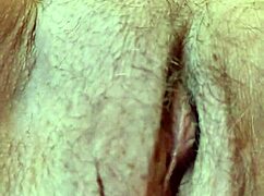 Mature woman plays with pussy close-up, dirty talking in sexy voice