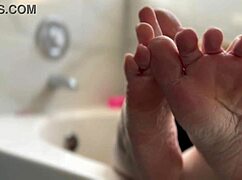 blonde babe shows off her oiled feet