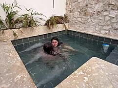 two hot lesbians masturbating in a public pool, scared of getting caught.