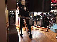 A french maid vacuums the house in a short skirt