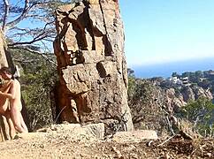 Watch this hot couple fucking outdoors on the beach path.