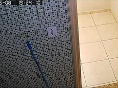 Hidden Camera Records Chubby Neighbor Shaving Pussy