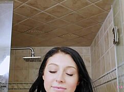Brunette fashion model takes a relaxing shower