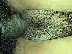 an indian girl shares a tender moment with her young dad in a homemade setting