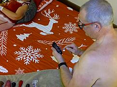 Granny Carmen Claus sucks head elf's cock