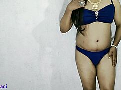 Indian shemale in blue bikini crossdresses seductively in part 6