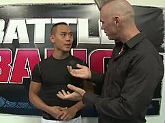 Lexi Belle is getting pounded hard by a muscular Asian stud in bed.