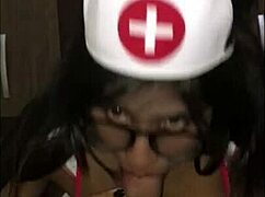 The latina nurse cares for her young patient in the hospital