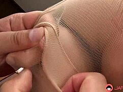 Japanese wife Nozomi Hazuki had a mouthful of cock in the kitchen uncensored.