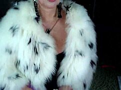 MATURE BITCH IN FUR COAT PERFORMS SEX