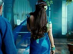 Rani Mukharji slips out of her saree, flashing panty glimpses and curvy ass cheeks in tight view.